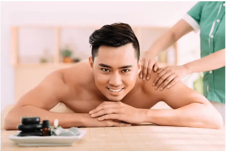 man happily enjoying the malayali massage
