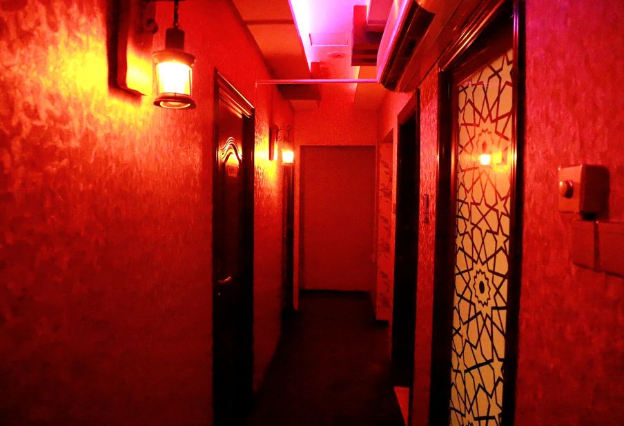 Red lighted corridor in spa ajman